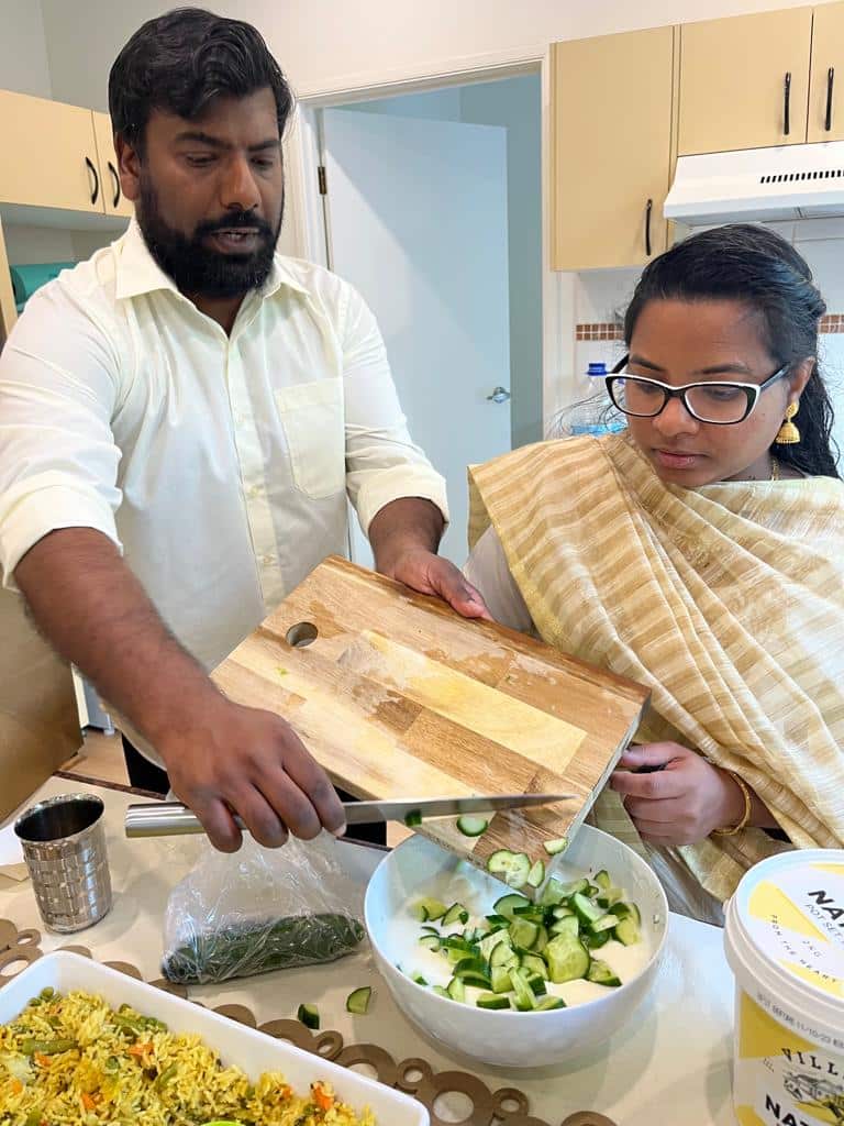 Farrisa and Naseer in Sydney involving in meal preparation during Ramadan