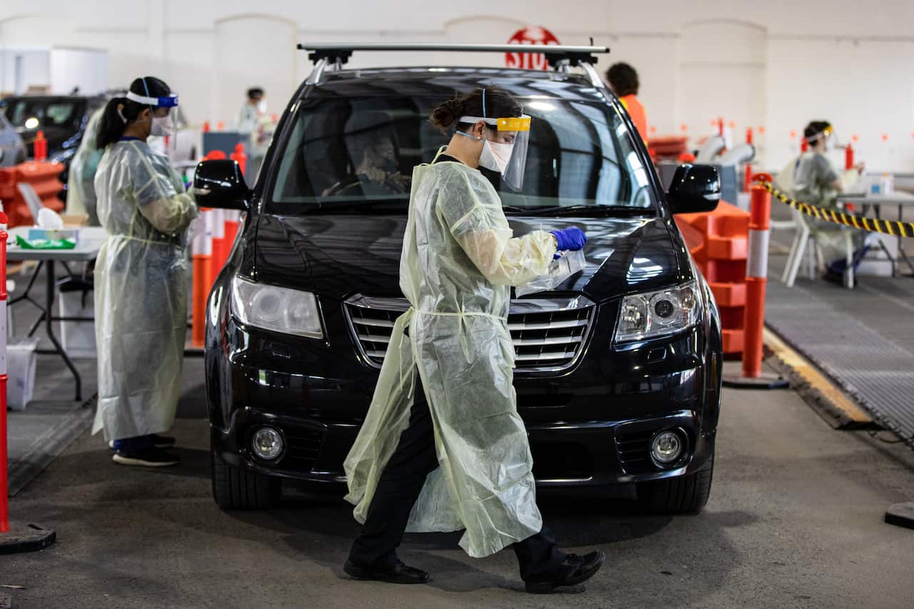 Healthcare workers at a COVID-19 testing site in Melbourne