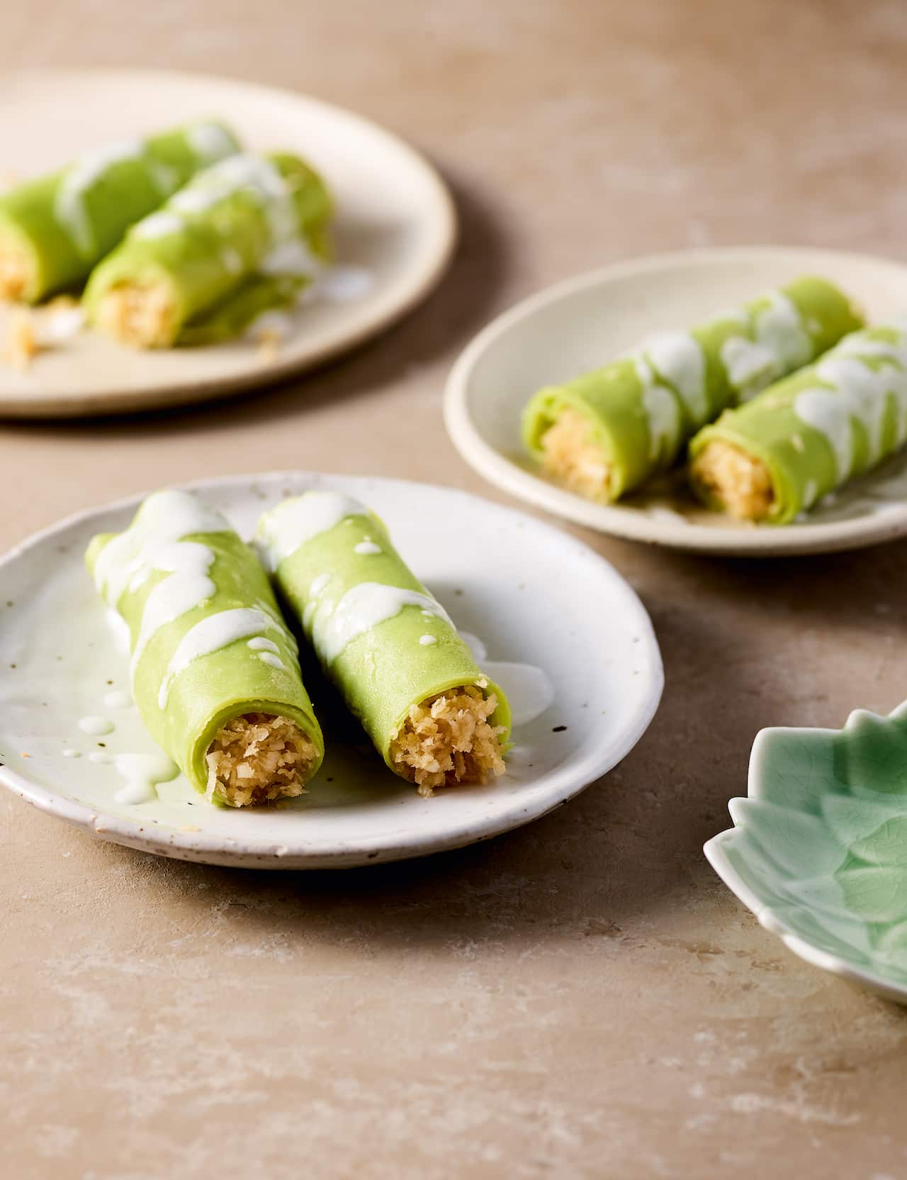 PANDAN CREPES WITH COCONUT FILLING p. 297 2000px.jpg