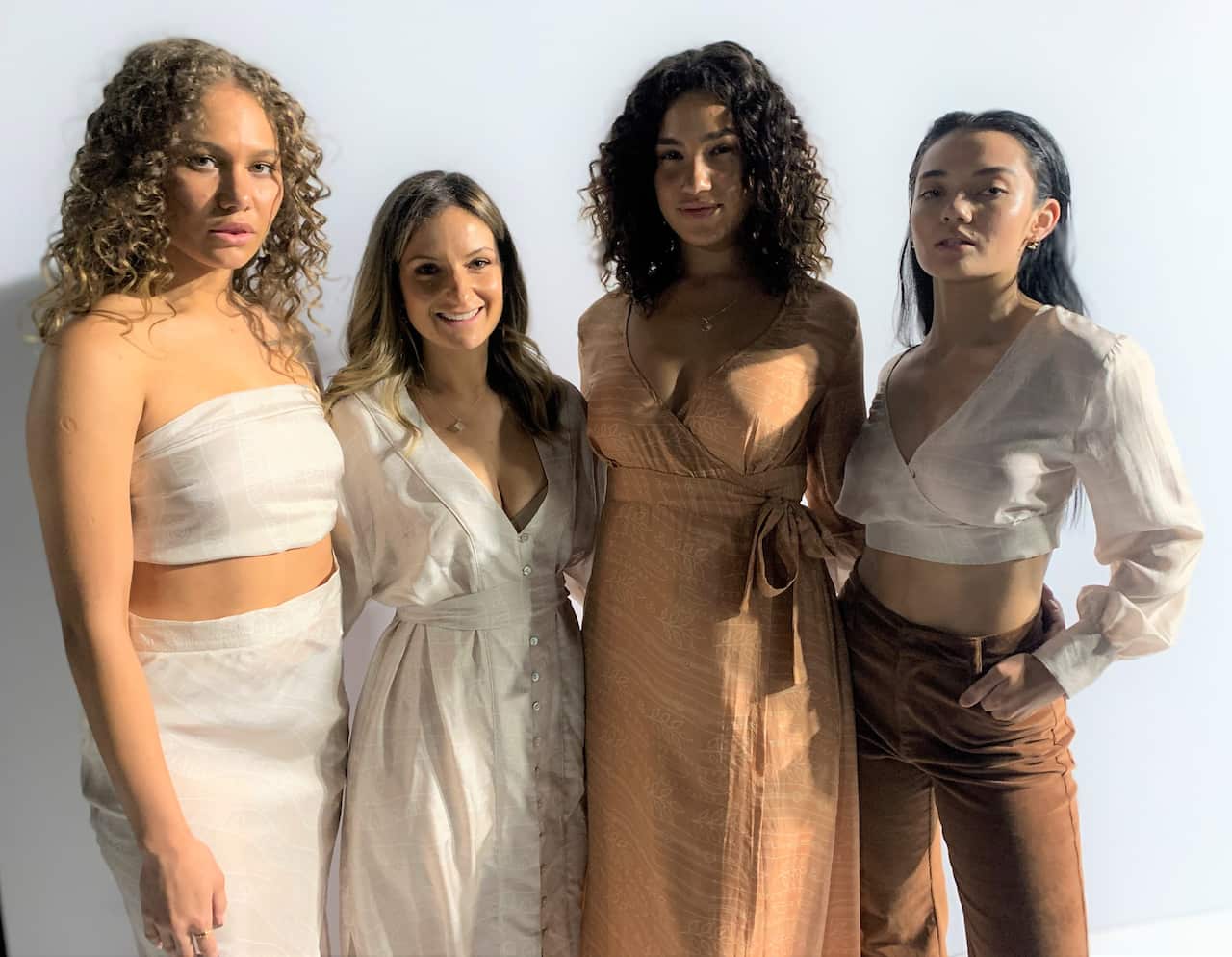 Corina with models showing her adult clothing range 