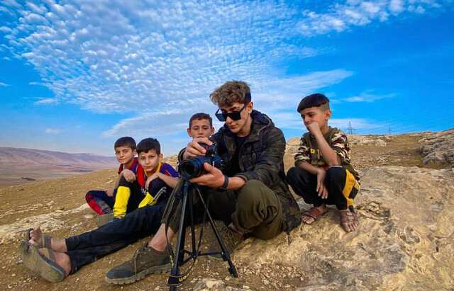 Rami with cousins.jpeg