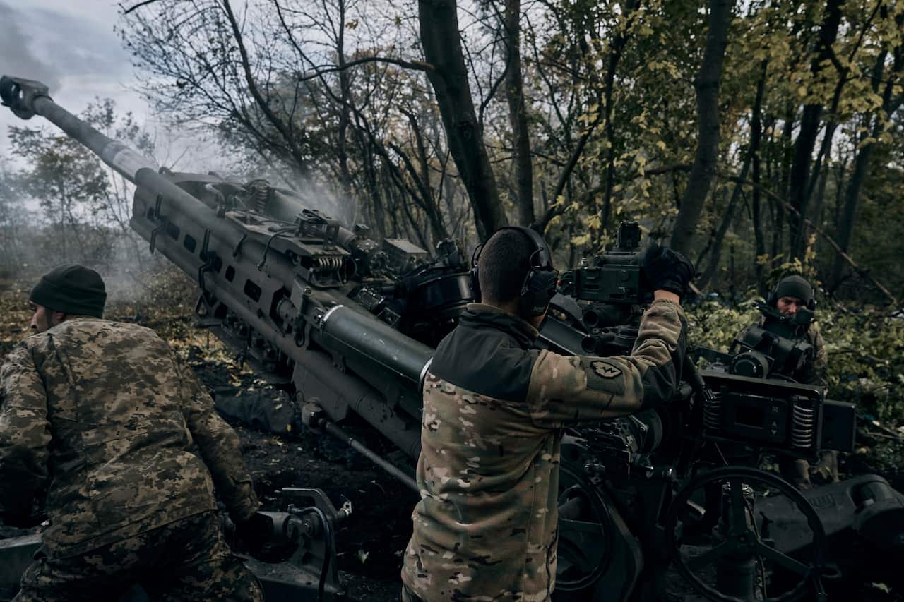 Ukrainian soldiers firing a long-ranged weapon.