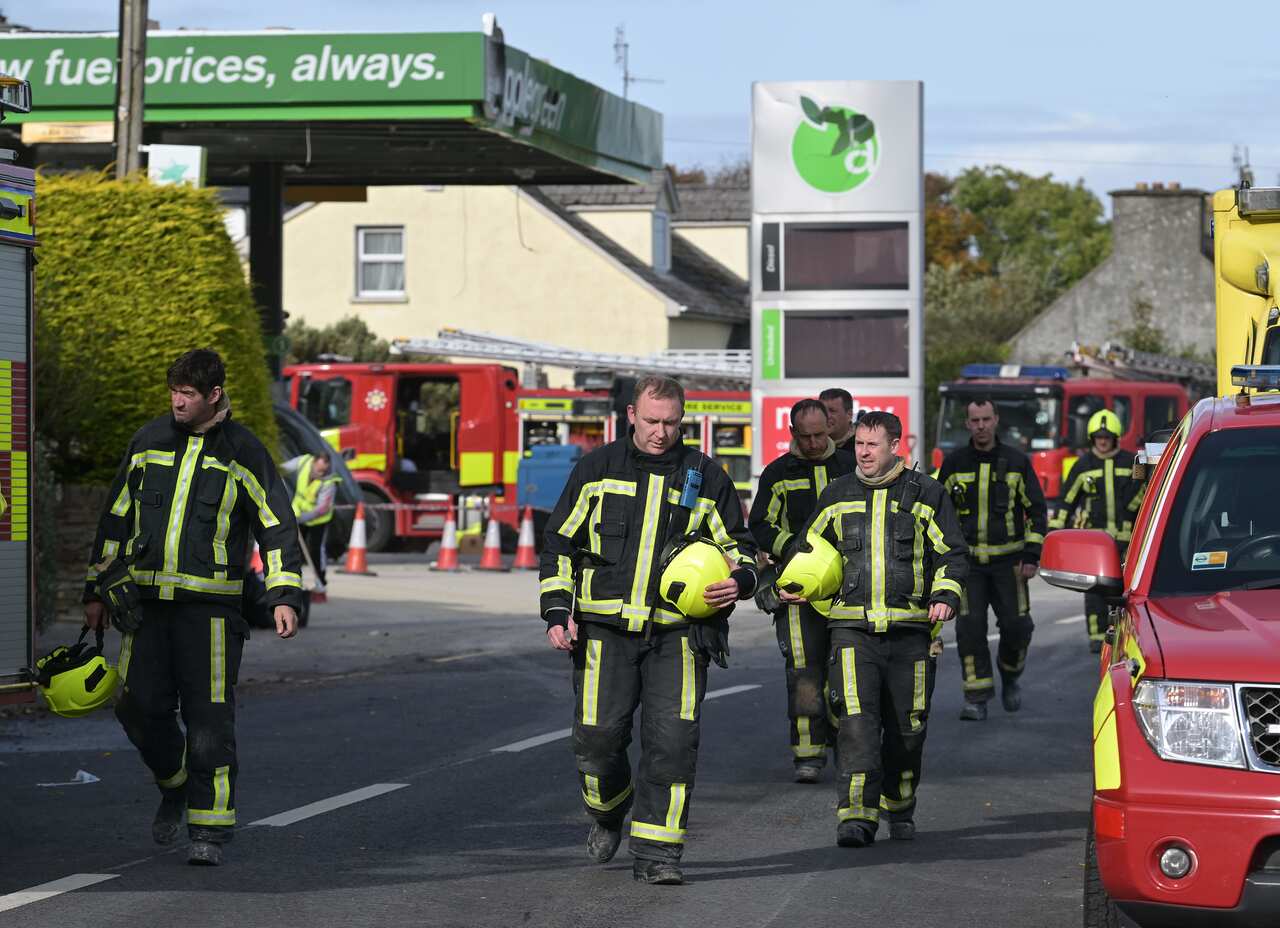 Emergency service workers at a petrol station in Ireland where there was an explosion.