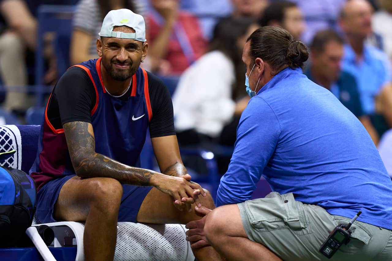 Nick Kyrgios gets medical treatment during his match against Karen Khachanov.