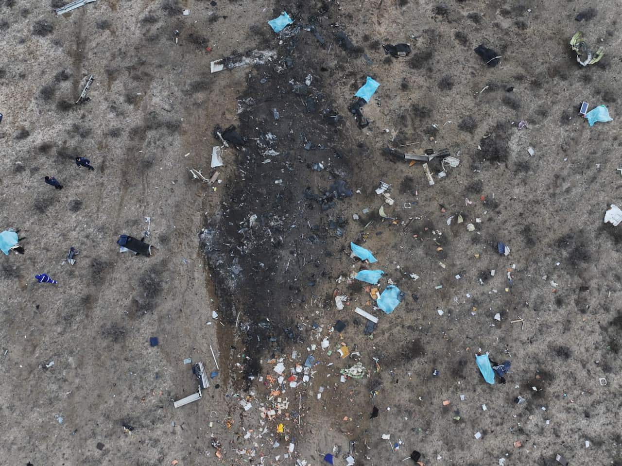 Debris at the crash site of a passenger plane.