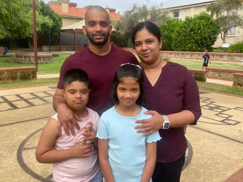 Two adults with two children