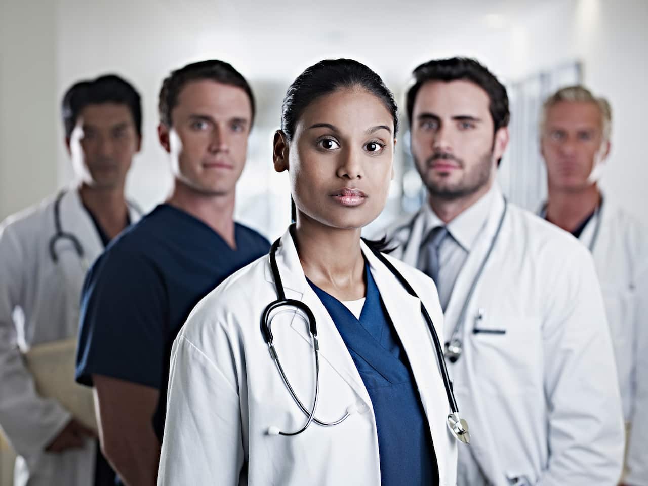 Portrait of confident doctors and nurses
