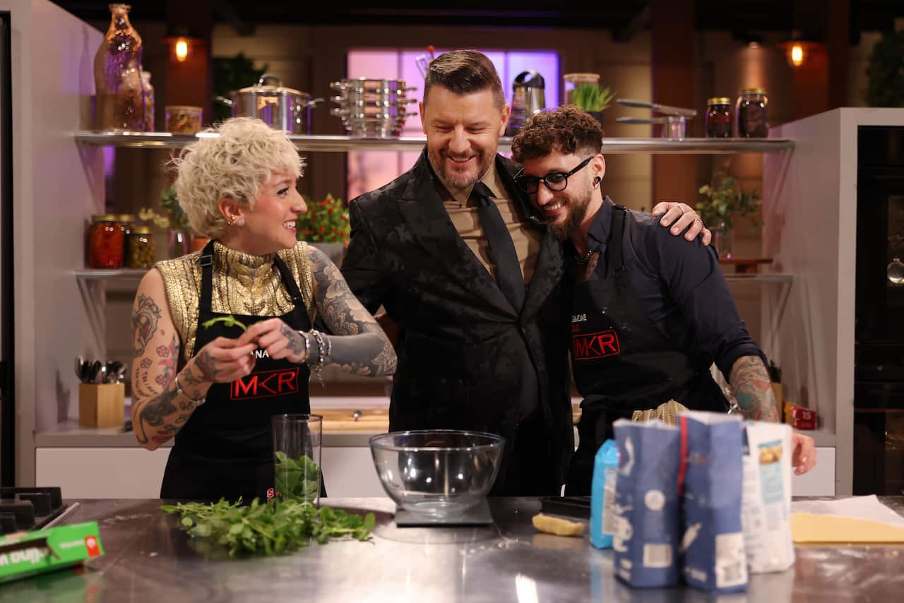 Simone and Viviana in MKR kitchen with host Manu Feildel