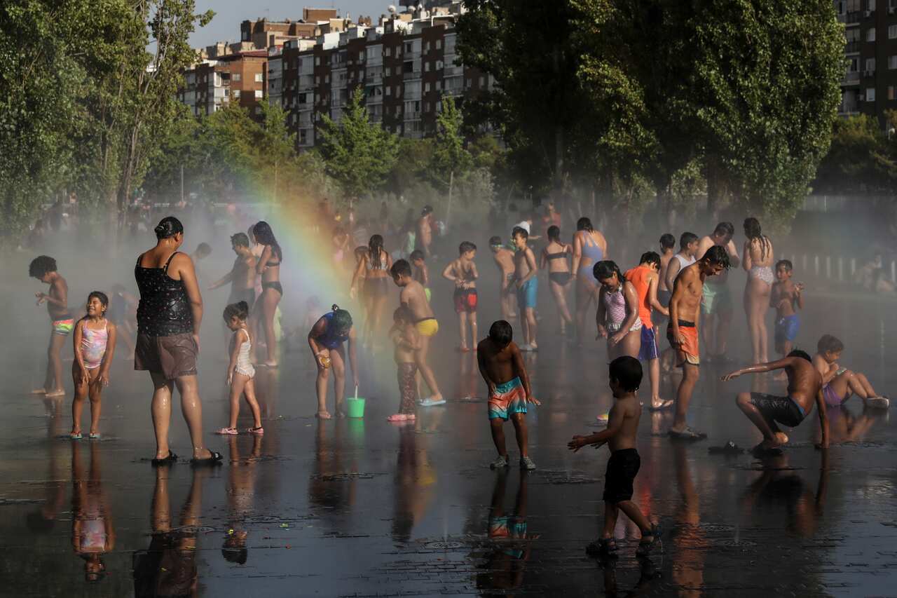 Children playing in a fountain