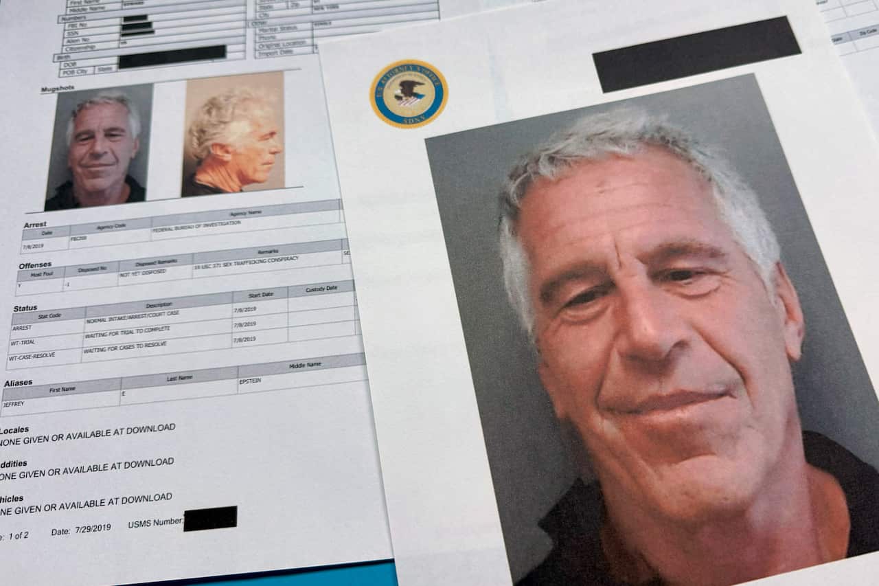 Documents including mug shots if an older white man with short white hair