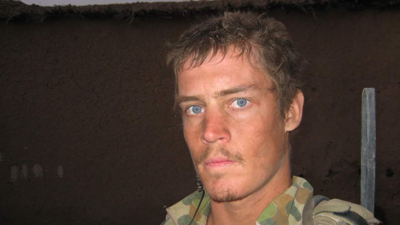 A man in a camoflage uniform