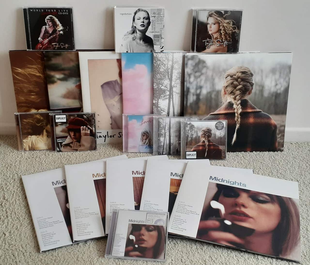 A pile of albums and vinyls. 