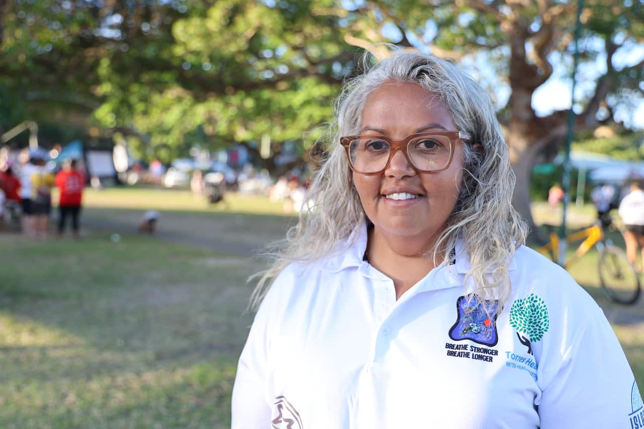 Torres Health CEO, Renee Williams, stands on the beach front of Waiben - Thursday Island.