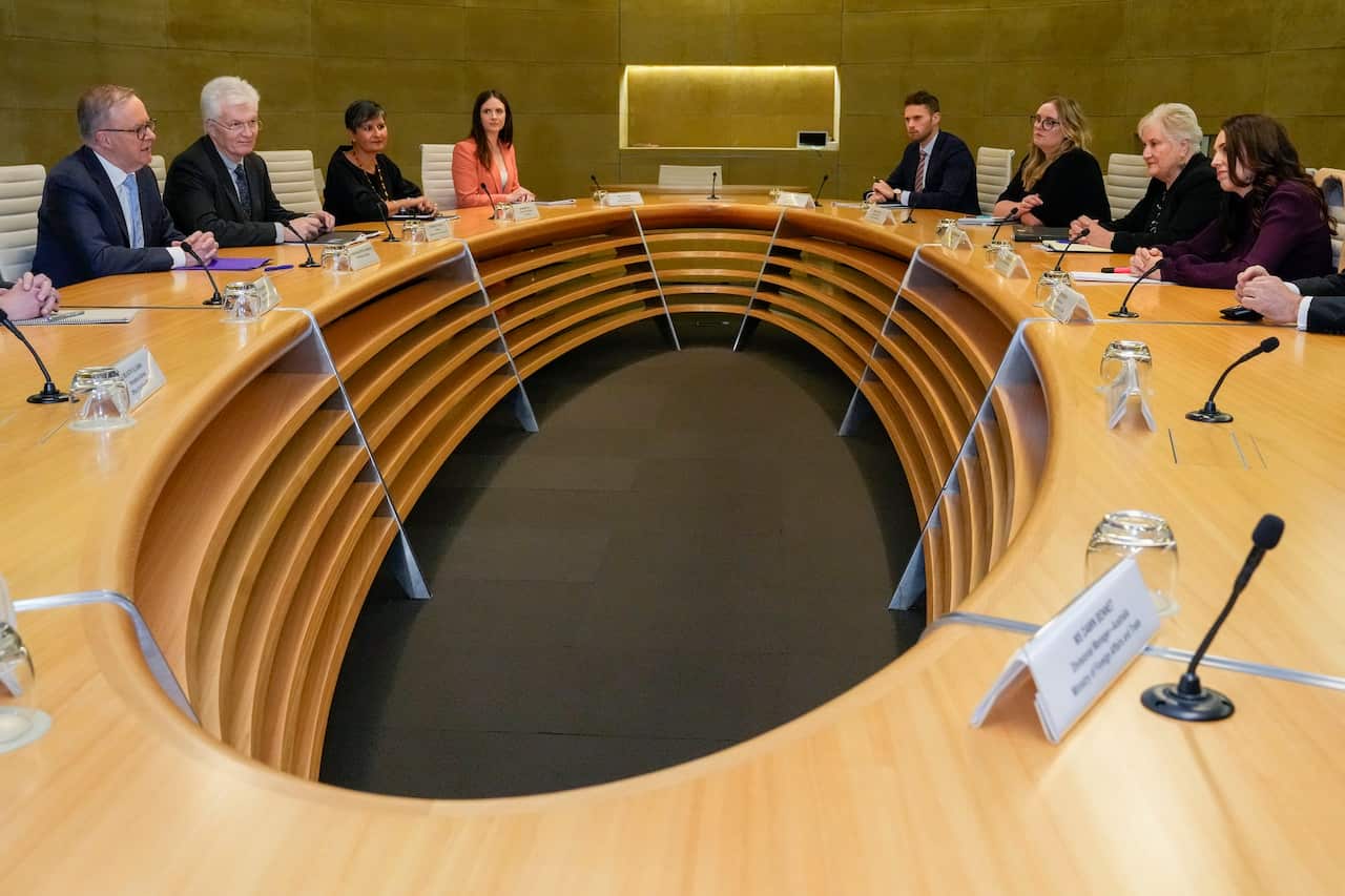 New Zealand Prime Minister Jacinda Ardern (right) talks to Australian Prime Minister Anthony Albanese (left) sit around a roundtable for their bilateral meeting in Sydney.