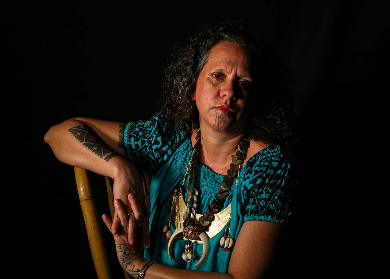 A woman with facial markings