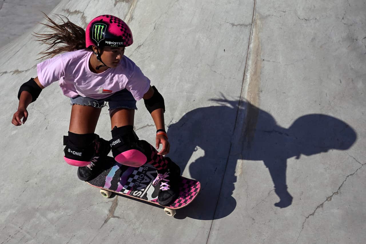 A woman on a skateboard