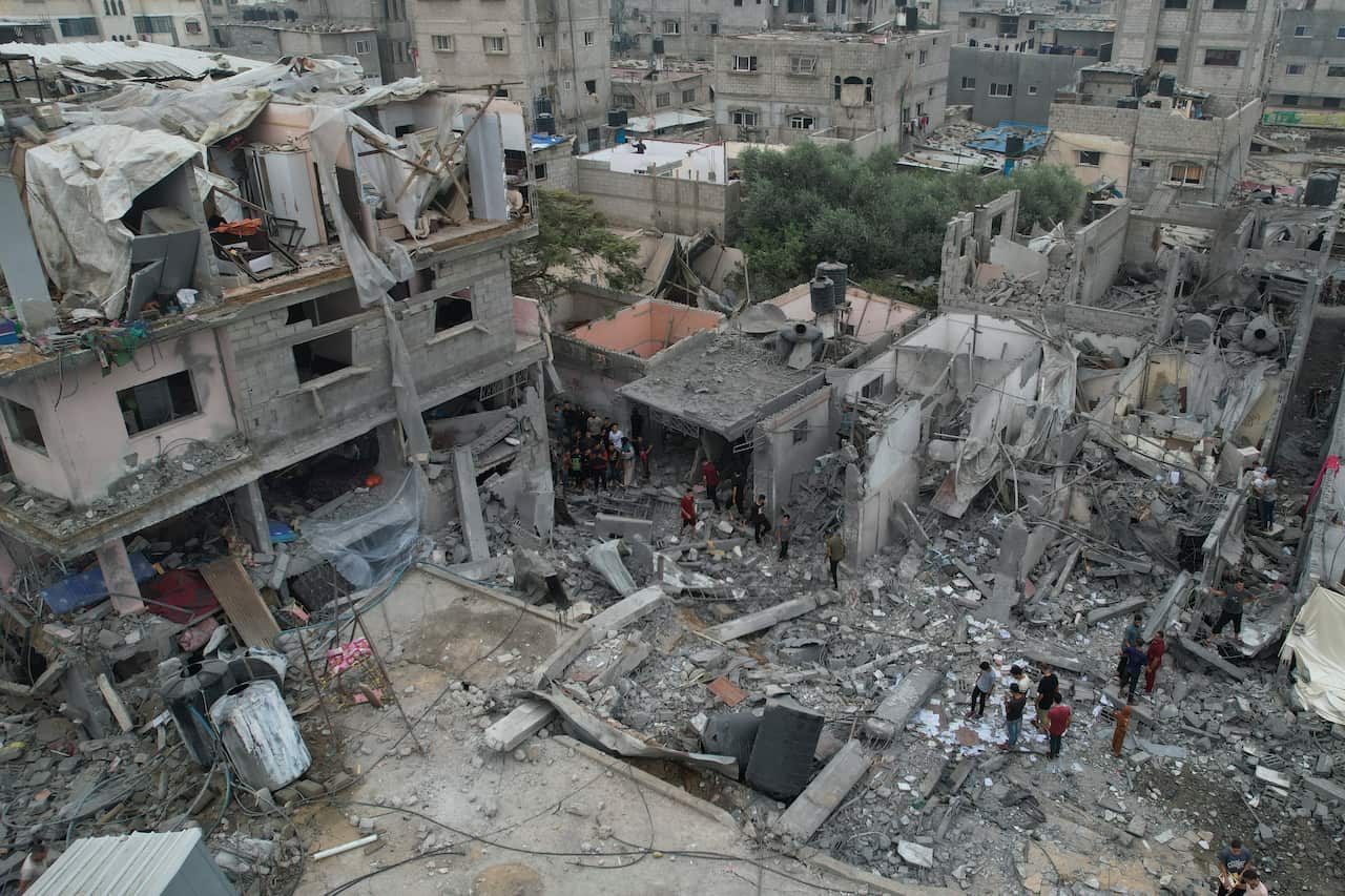 A crowded city complex destroyed by bombs