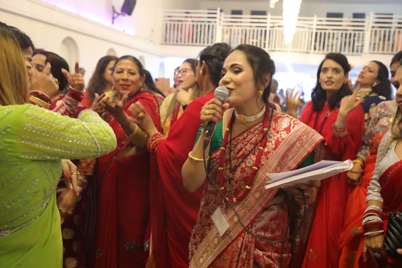 Attendees were seen dancing to Teej songs at the Teej celebration event in Sydney.