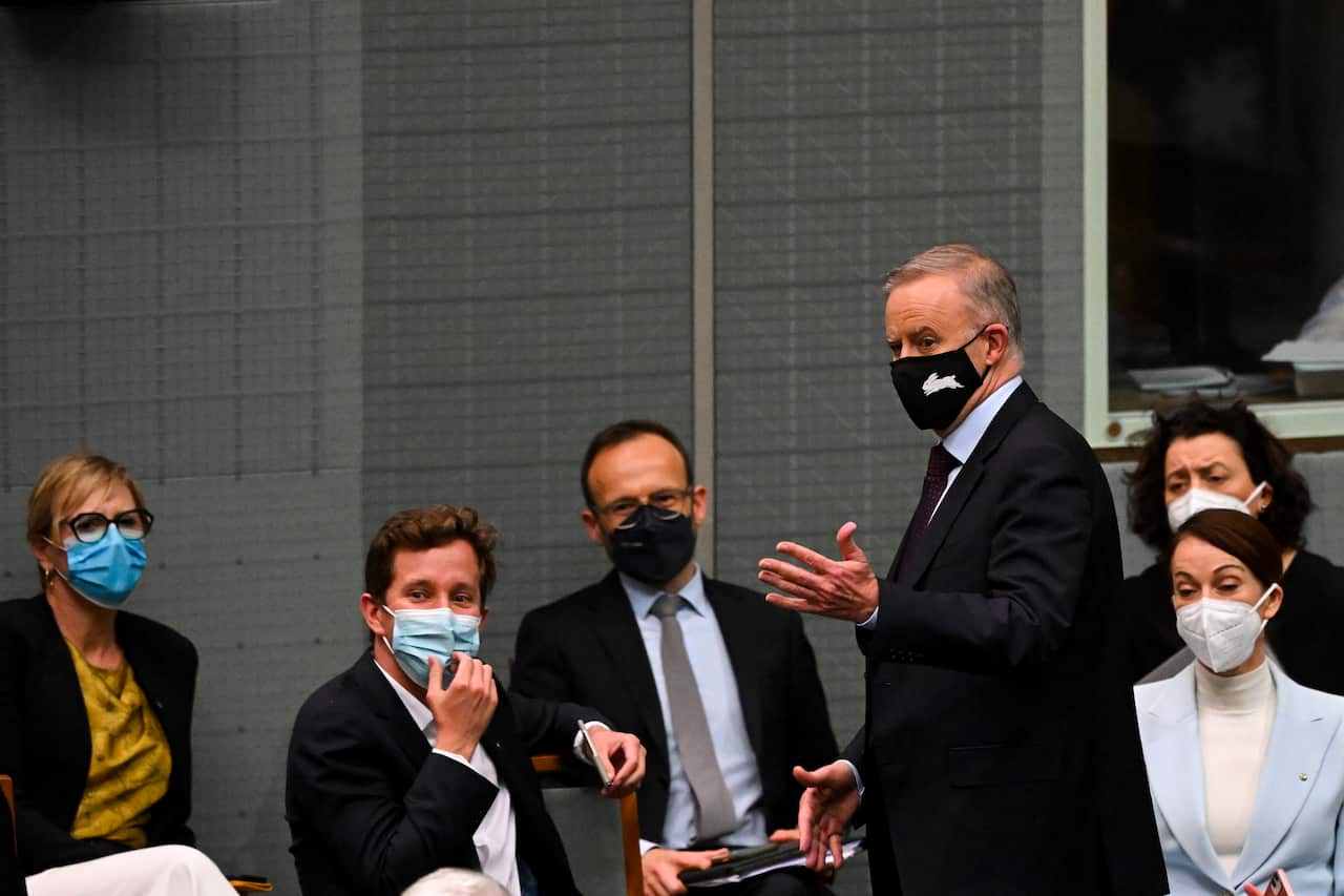 Prime Minister Anthony Albanese engages with members of the Greens and the crossbench.