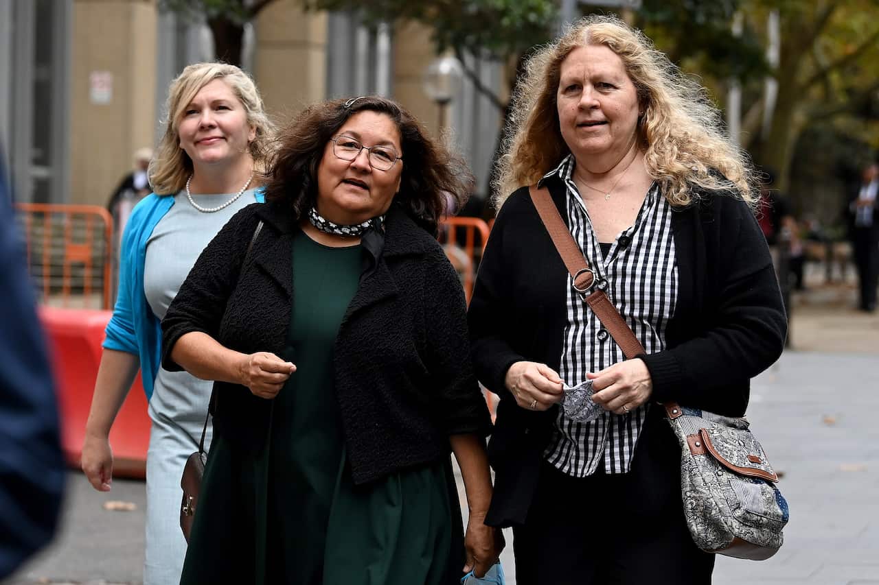 (L-R) Rebecca Johnson, Rosemary Johnson, and Terry Johnson - who are family members of Scott Johnson - attend the New South Wales Supreme Court on 2 May 2022. 