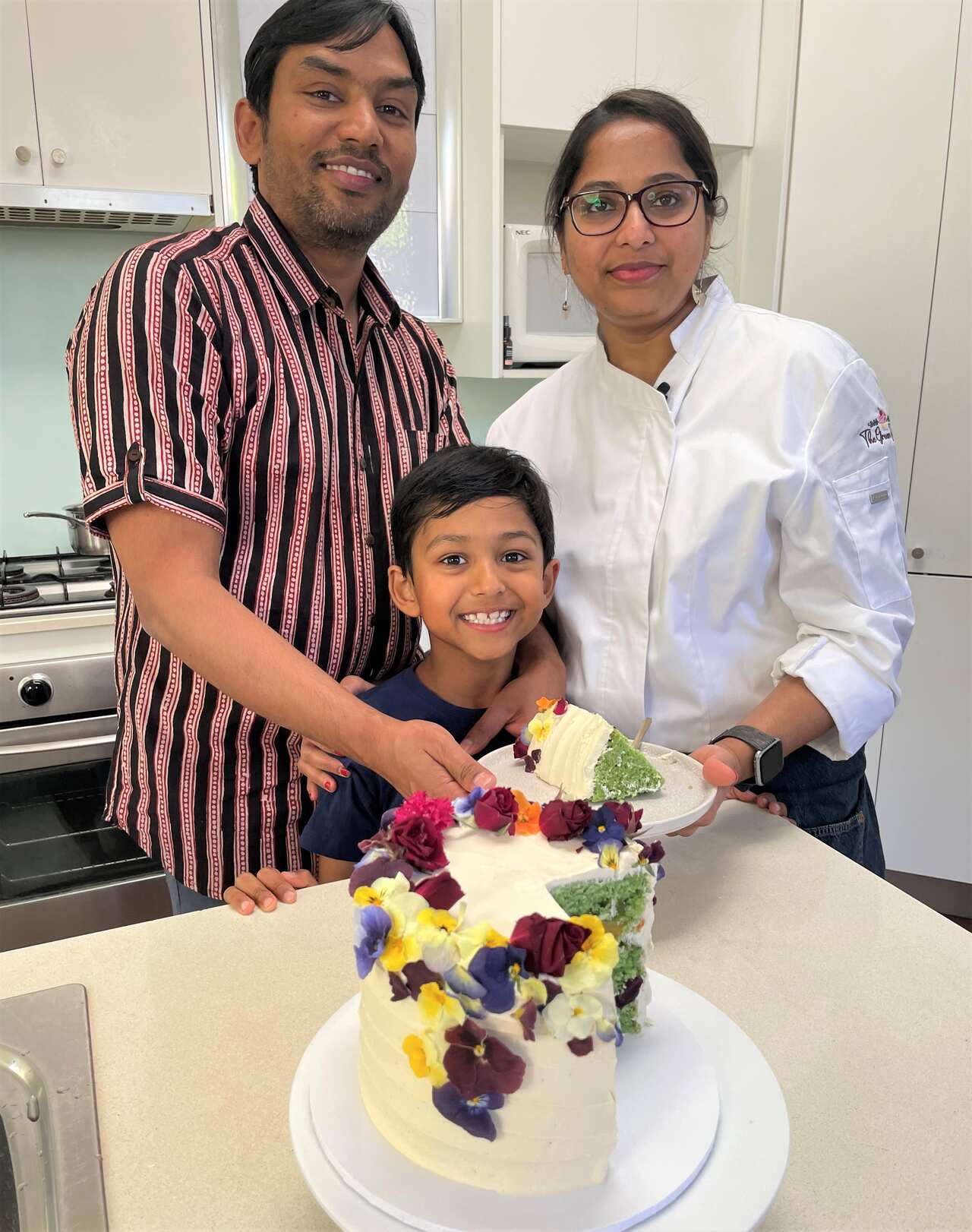 Deepthi (right) with her husband Kiran and son 