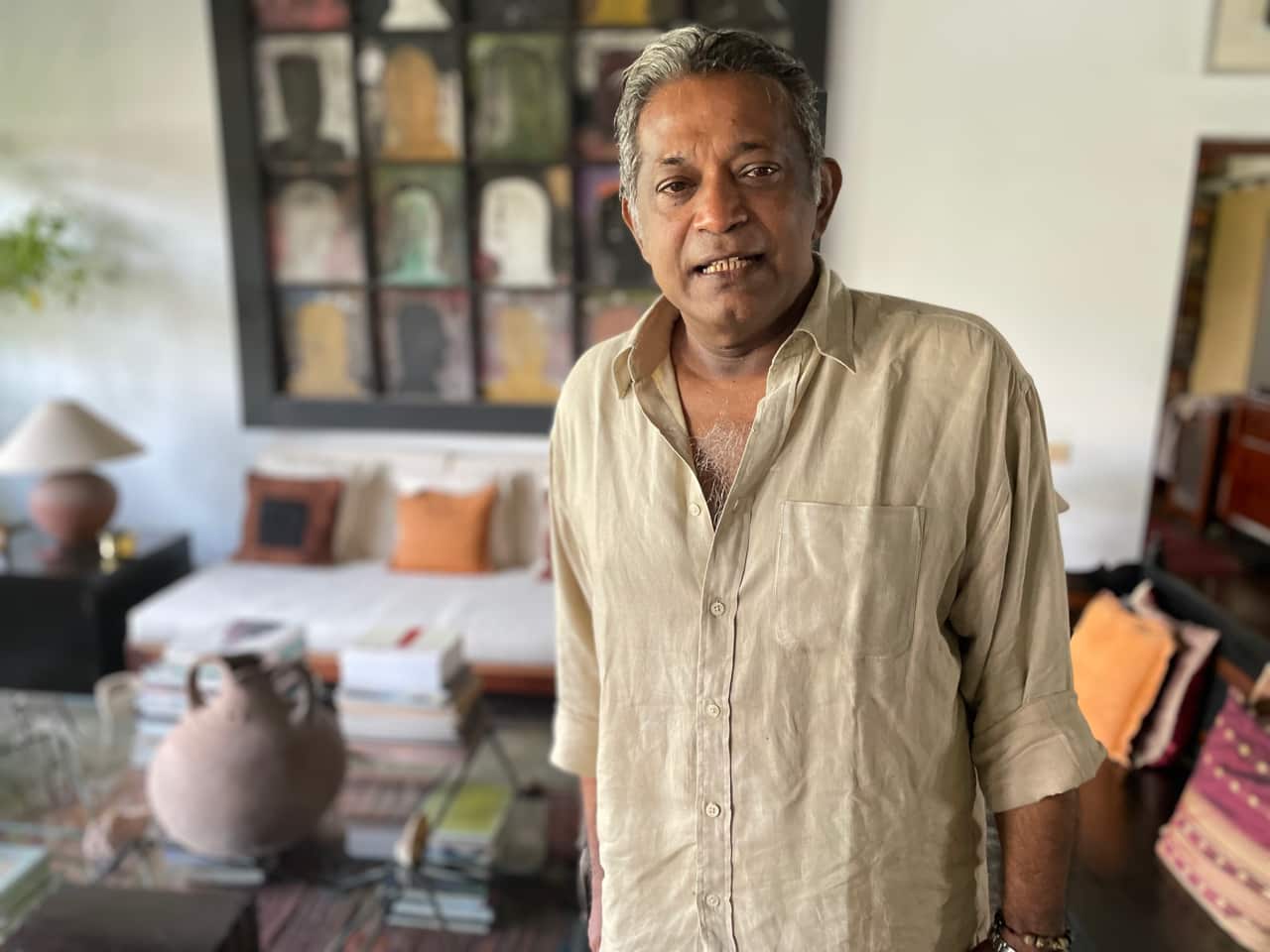 Political analyst Dr Paikiasothy Saravanamuttu stands in his house in Colombo, Sri Lanka