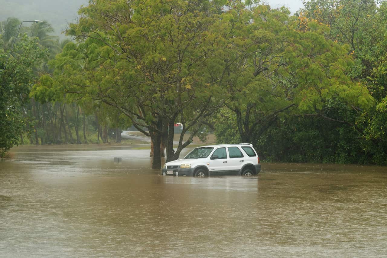 A car in flood water.