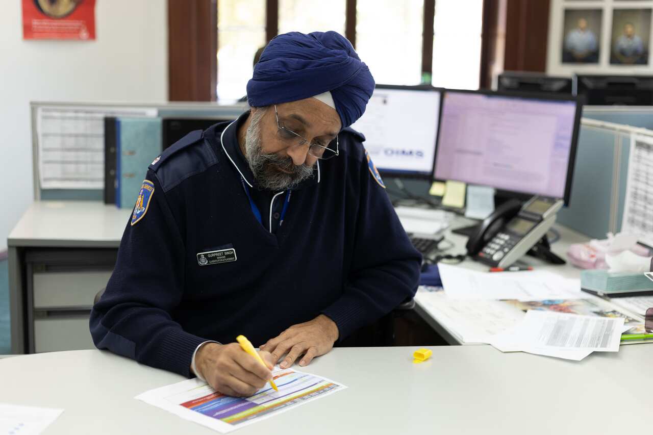 Gurpreet Singh at desk.JPG