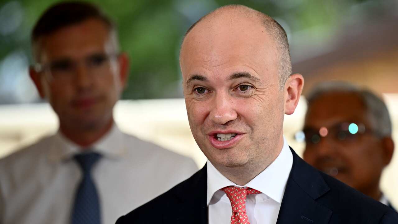 NSW Treasurer Matt Kean addresses media with Premier Dominic Perrottet and Roads Minister Natalie Ward during a visit to a first home buyer during the NSW Liberal Party election campaign in Quakers Hill, west of Sydney, Wednesday