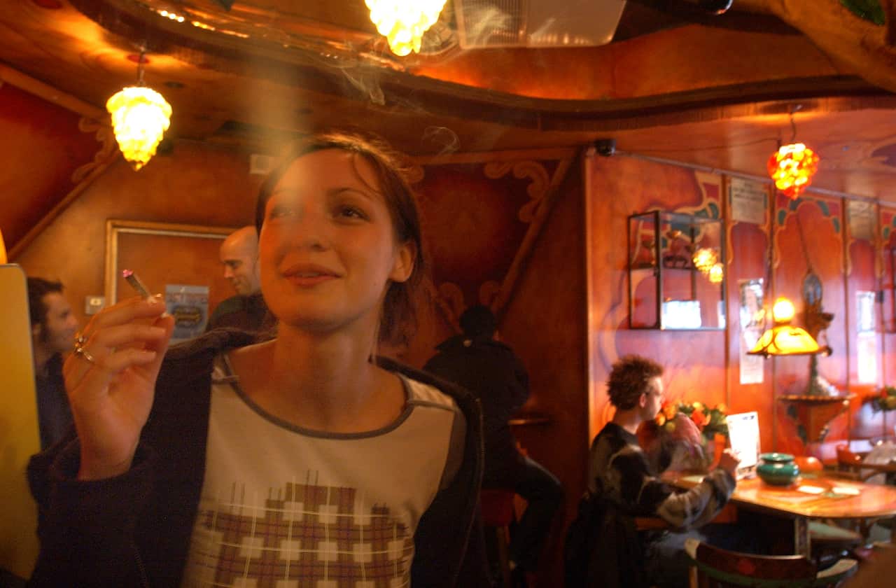 Woman smoking a joint.