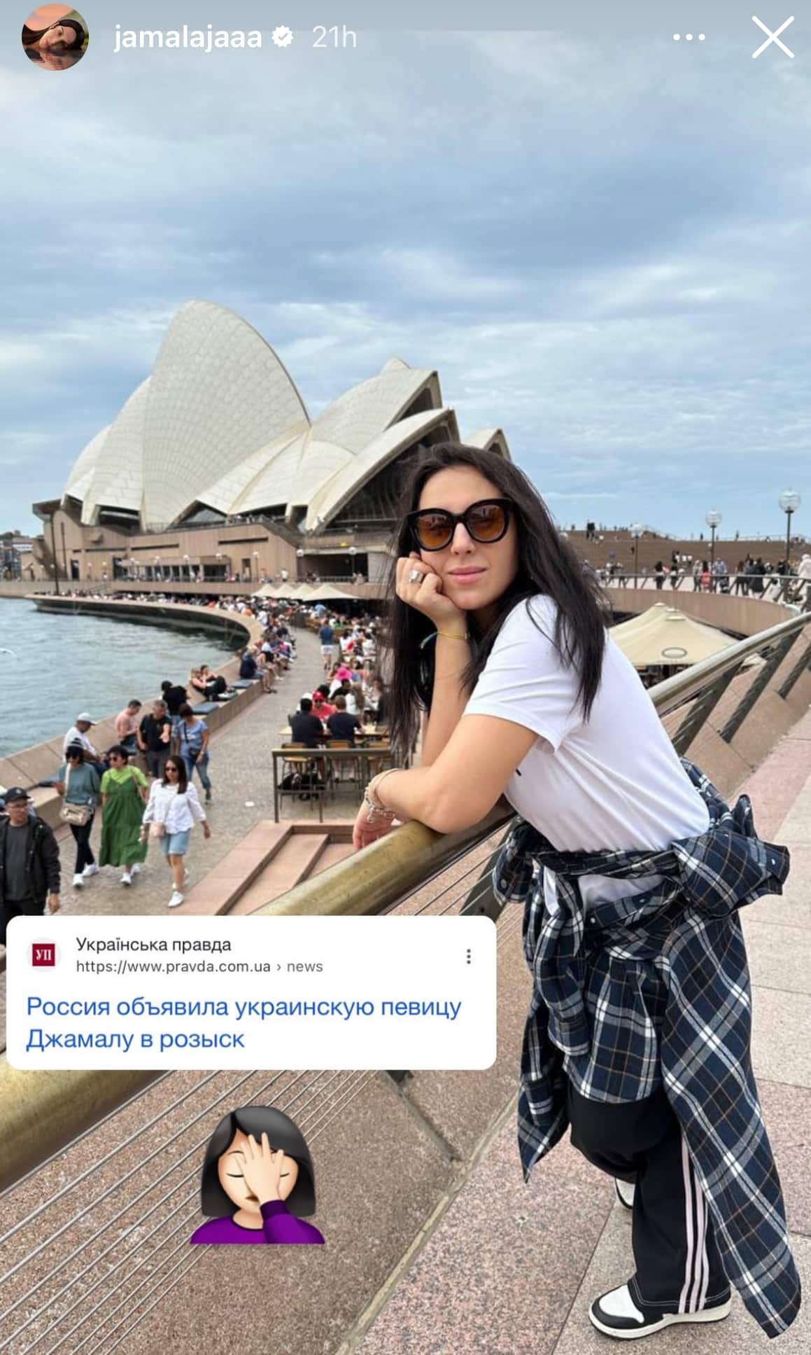 A woman posing in front of Opera House