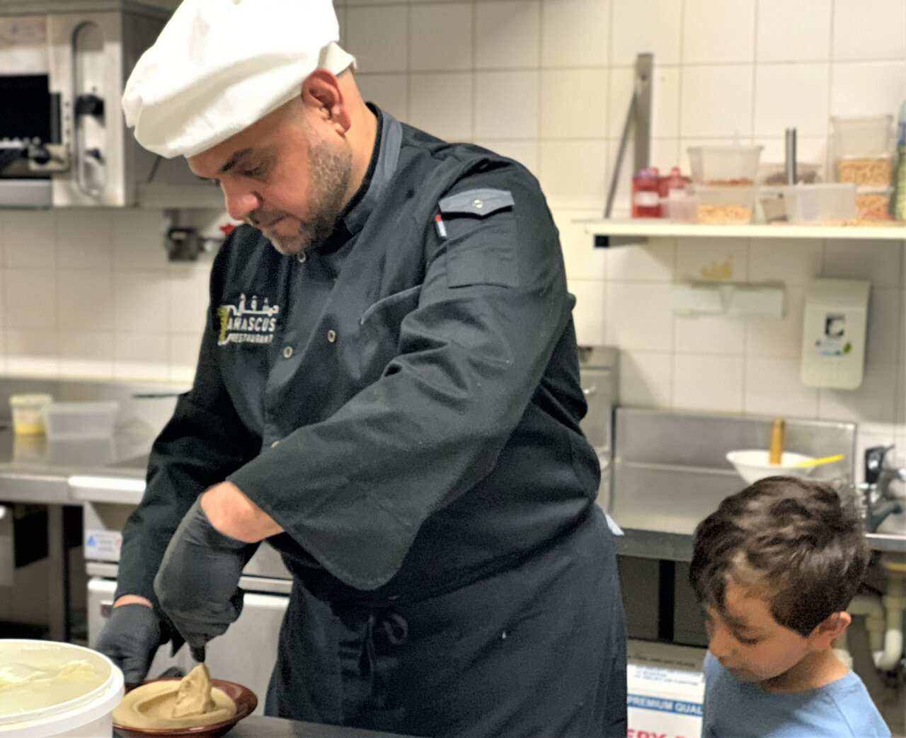 Mr Almardoud at work in his restaurant 