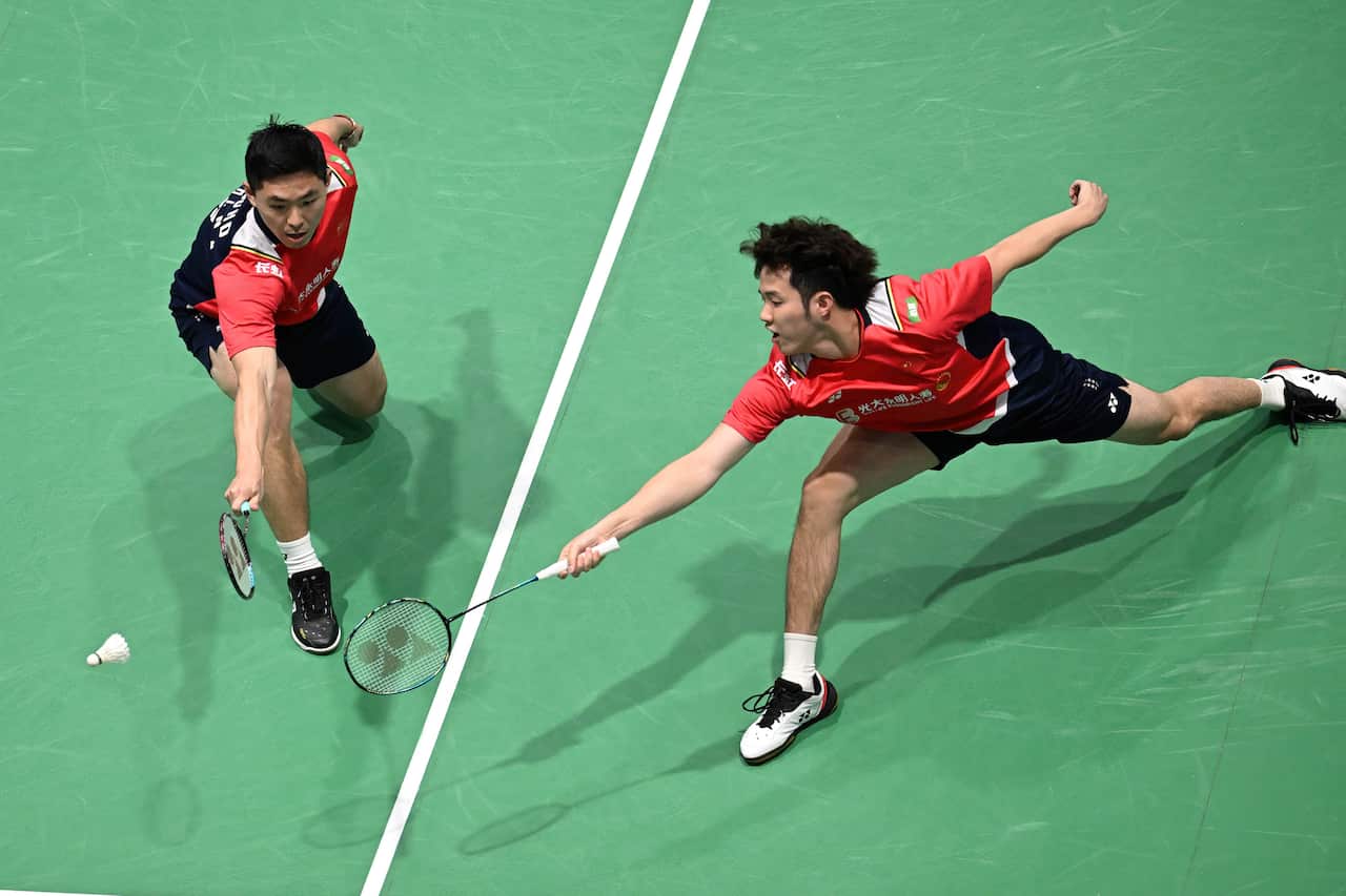 Zhou Hao Dong (L) and He Ji Ting (R) of China 