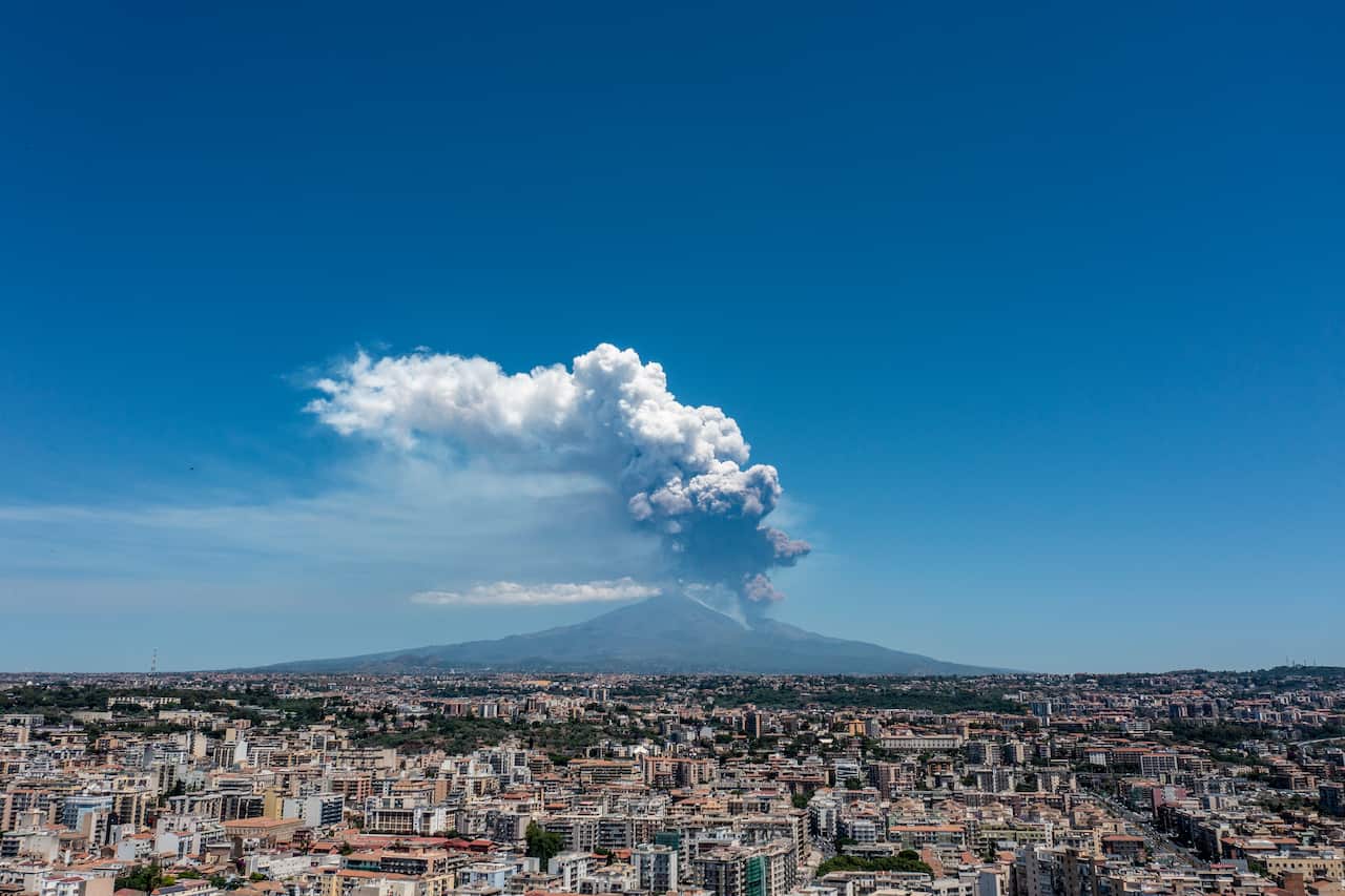 A large plume of smoke above Mount Etna.