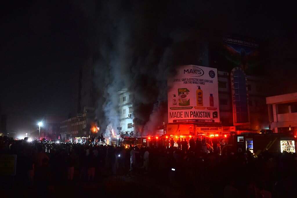 A photo showing a shopping mall on fire.