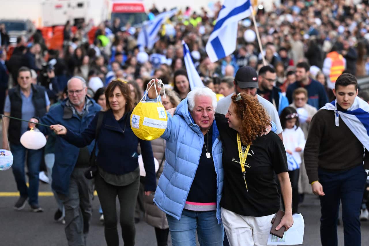 People attend a rally.