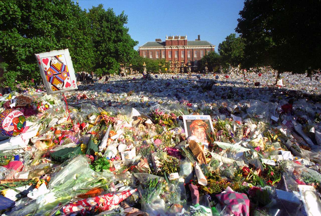 Thousands of flowers are placed outside London's Kensington Palace following the death of Princess Diana in 1997.