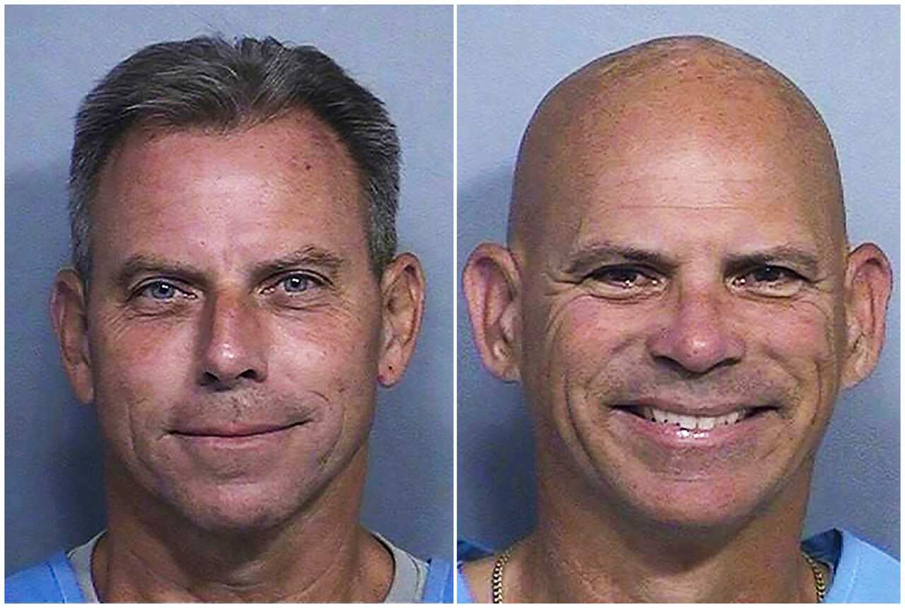 A composite image of two smiling men wearing prison suits.