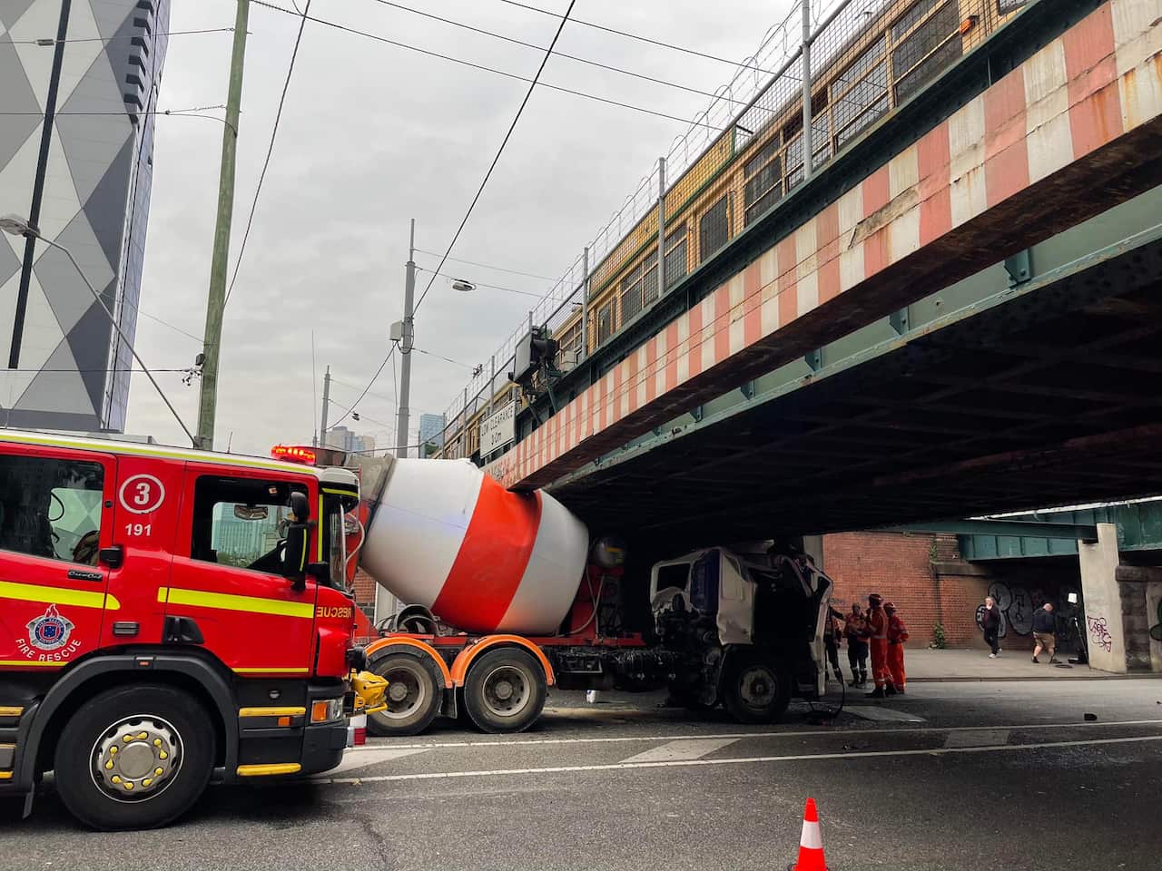 Concrete truck crash with bridge.