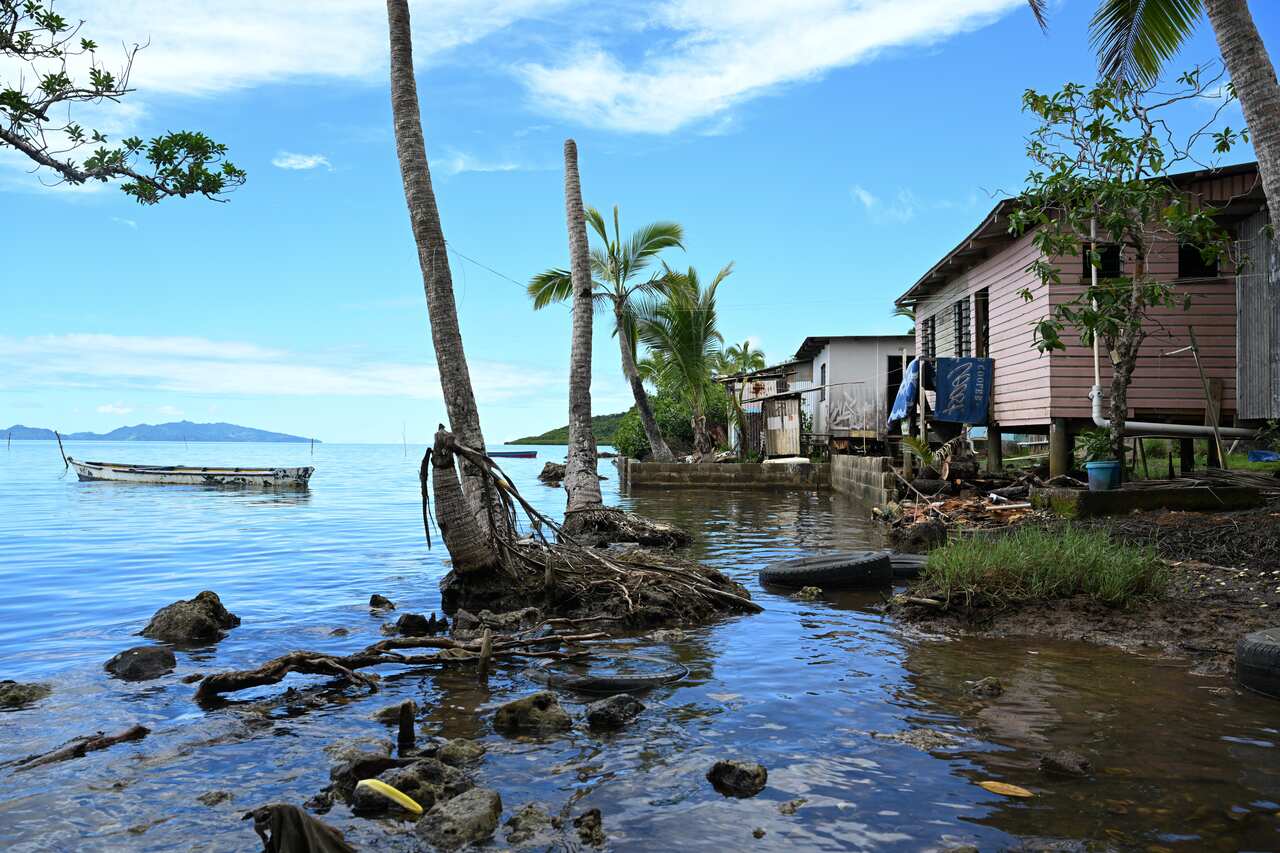 Houses flooded by sea water.