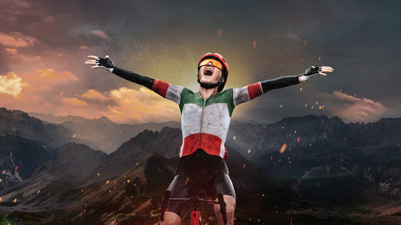 A cyclist with open arms in Tour De France Femmes TDFF 2024.