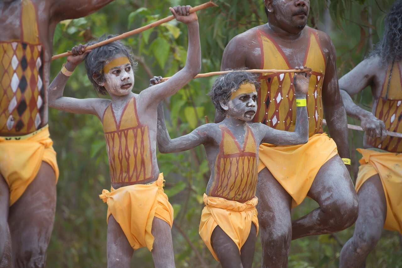 Dancers dressed in traditional costume and makeup open the Garma Festival. 