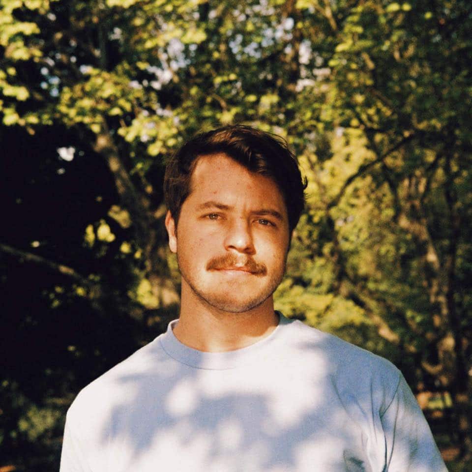 Craig Campbell standing outside