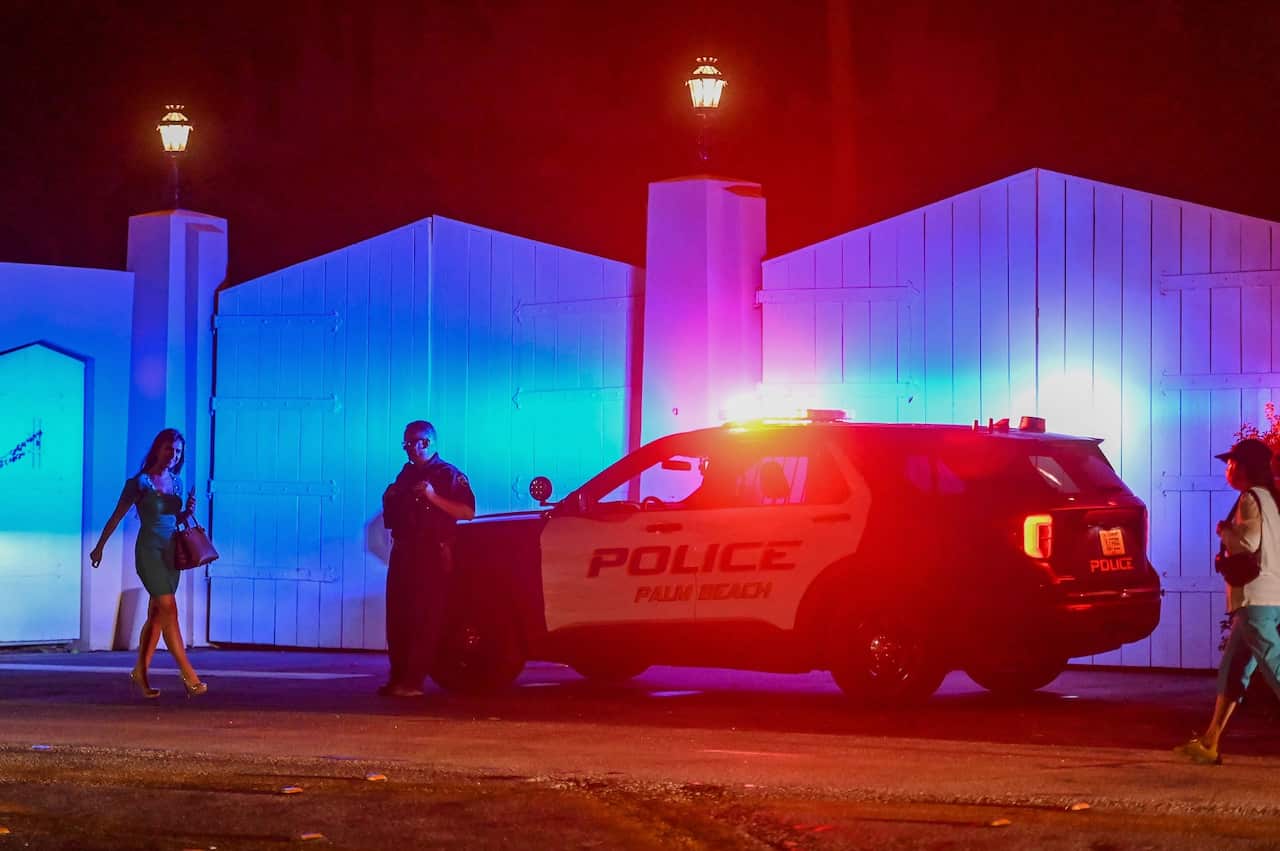 A police car outside former US President Donald Trump's residence in Mar-A-Lago, Palm Beach, Florida