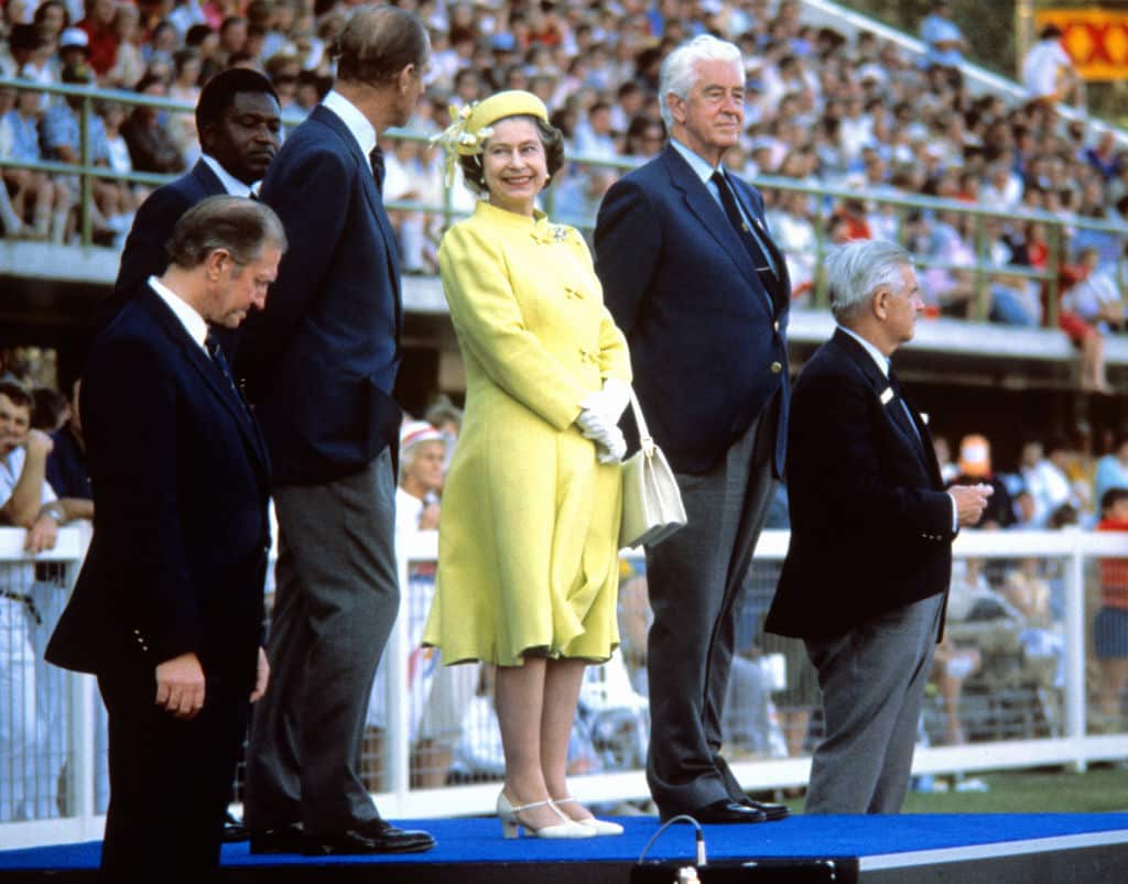 Queen Elizabeth II (centre), smiles at Prince Philip during the closing ceremony of the 1982 Commonwealth Games in Brisbane 