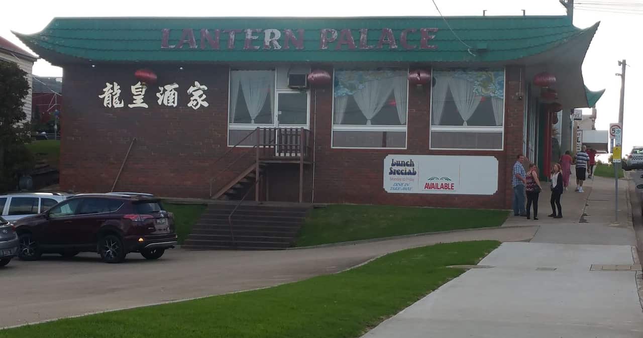 A Chinese restaurant with green pagoda-style roof