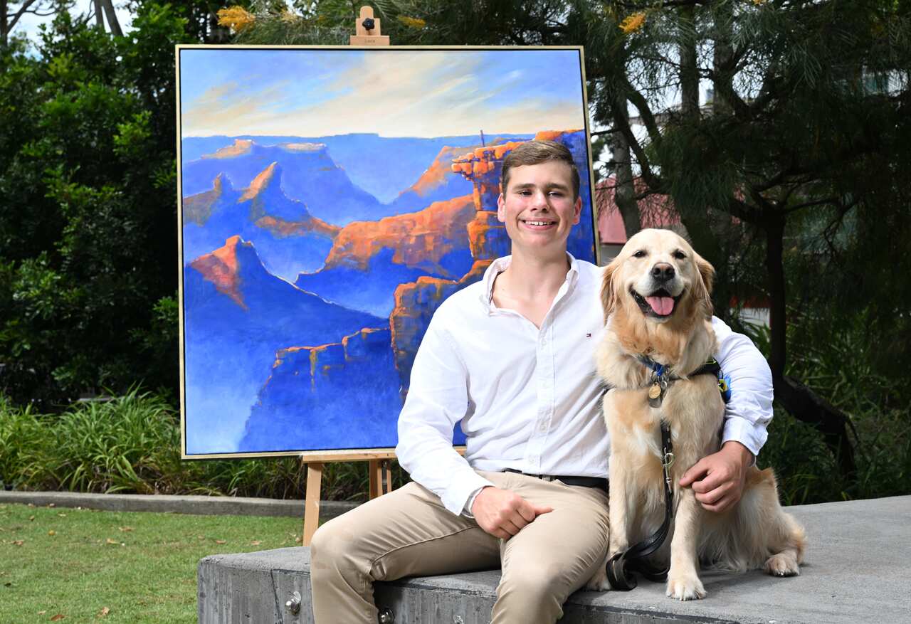 Vision impaired 14 year old Oliver Fanshawe with his Seeing Eye Dog Sadie