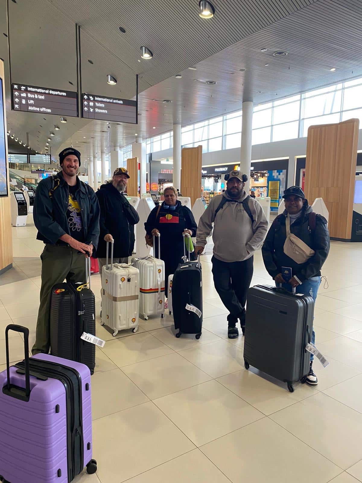Indigenous desert rangers departing Perth Airport for France – from ledt Ed Muir- Boyd Elston- Lynda Lechleitner- Sumayah Surprise.JPG