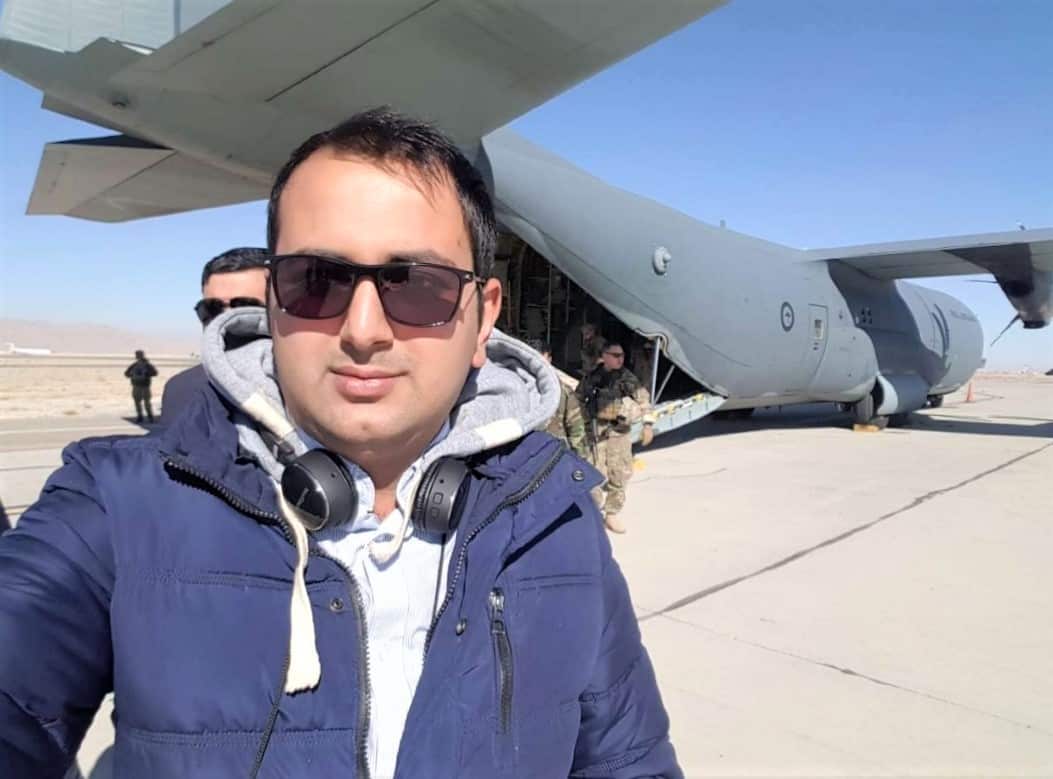 Jahidullah Tokhi in Afghanistan with a military plane.