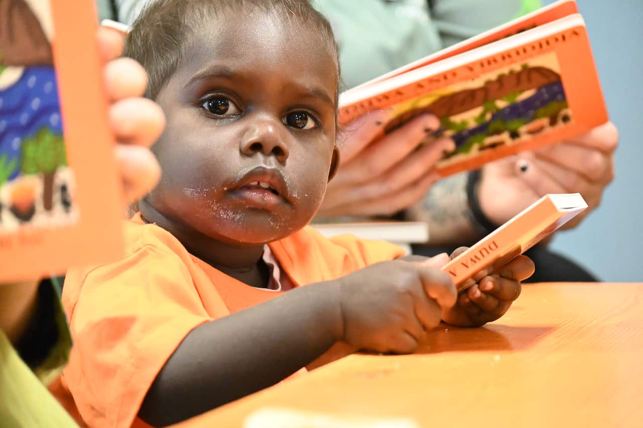 Children learn to love literacy with parents at the Families as First Teachers early learning centre in Gunbalanya